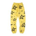Front view of the vibrant yellow Sp5der 5Star sweatpants featuring a black star logo pattern throughout the design.