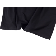 A close-up view showcasing the premium fabric texture and reinforced hem of the SP5DER Hellcat Kenny streetwear t-shirt.