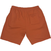 Back view of the Sp5der Worldwide sweat shorts in orange, showing the relaxed fit and premium cotton construction.