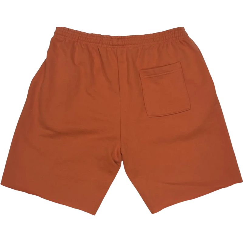 Back view of the Sp5der Worldwide sweat shorts in orange, showing the relaxed fit and premium cotton construction.