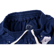 Interior label detail of the navy blue Sp5der Worldwide OG Web Logo sweat short with drawstring waist.