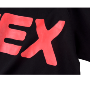 Close-up view of the bold pink 5EX graphic print on the premium black Sp5der designer top apparel item.