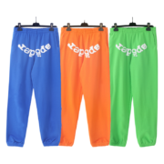 Sp5der Websuit sweatpants collection in royal blue, orange, and green colors with the iconic signature white branding.