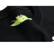 Detail view of the Sp5der Worldwide Star Beluga black T-Shirt with a bold celestial graphic on premium cotton fabric.