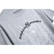 Grey Sp5der Arach Phobia New York graphic t-shirt featuring a detailed white spider web print on the front chest.