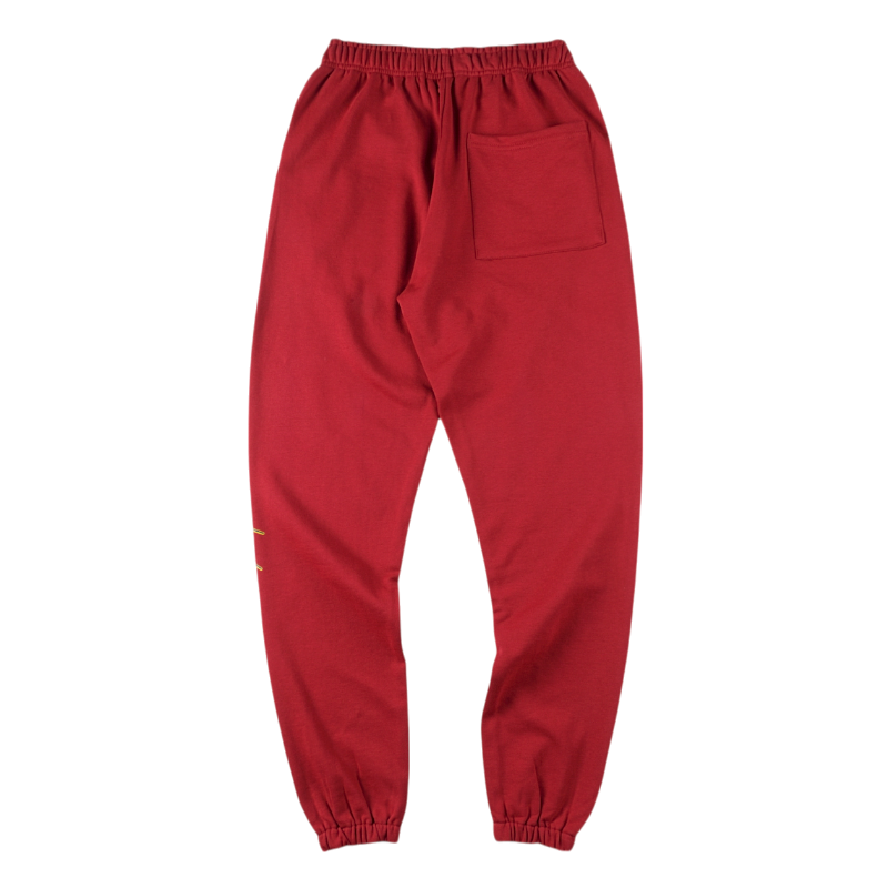 Back view of the SP5DER Logo Sweatpants in a vibrant maroon color, featuring soft fleece construction and a back pocket.