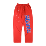 Unisex Sp5der Red Atlanta open leg sweatpants featuring a loose fit, heavy fabric, and detailed branding graphics.