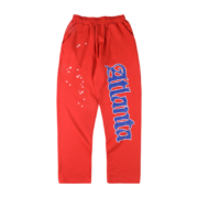 Unisex Sp5der Red Atlanta open leg sweatpants featuring a loose fit, heavy fabric, and detailed branding graphics.