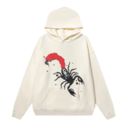 Sp5der x Mariah the Scientist Scorpion Hoodie in cream with a graphic print featuring a black and red scorpion design.