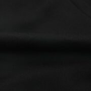 Close up view of the black premium fabric material used on the Sp5der Jeffery Sweatpants streetwear clothing.