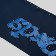 Sp5der Punk V3 Studded sweatpant 'Blue' close up