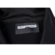 Close-up view of the SP5DER branding tag on the premium G550 performance outerwear jacket in black.