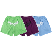 Three pairs of colorful Sp5der OG Web Logo sweat shorts displayed together in green, purple, and light blue shades.