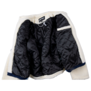 Sp5der wor1dwide 555555 Hunters Sherpa Jacket with a black quilted interior lining for urban winter comfort.