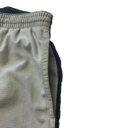 Side view of the grey Sp5der elastic waist shorts featuring a comfortable relaxed fit and signature streetwear style.