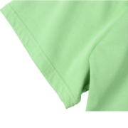 Close-up of the sleeve on the vibrant slime green SP5DER Worldwide streetwear t-shirt with durable reinforced stitching.