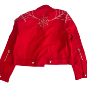 Back view of a vibrant red Sp5der denim jacket featuring a distinct rhinestone web graphic design on the shoulders.