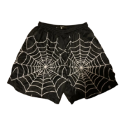 Front view of the Sp5der Lost Files streetwear shorts in black featuring a bold white spider web graphic design.