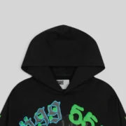 Close-up of the black Juice WRLD 999 x Spider Worldwide 555 hoodie showing the graphic design and brand tag details.