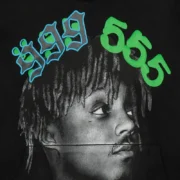 Close-up graphic detail of the Juice WRLD 999 x SP5DER 555 collaboration black fleece pullover hoodie for men.