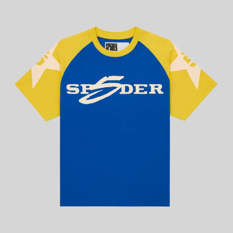 This Sp5der 5uki Tee showcases a bold blue and yellow color-block design with signature front and sleeve graphics.