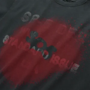 Close-up of the Sp5der Standard Issue black tee featuring a signature distressed red graphic print on the front.