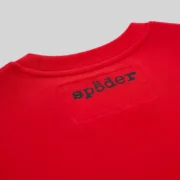 Close up of the red Sp5der Moto 5 Tee showing the signature SP5DER logo printed on the back neck area of the shirt.