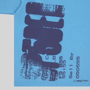 Close-up view of the Sp5der Commerce Tee in blue, featuring a dark blue distressed graphic print on the front fabric.