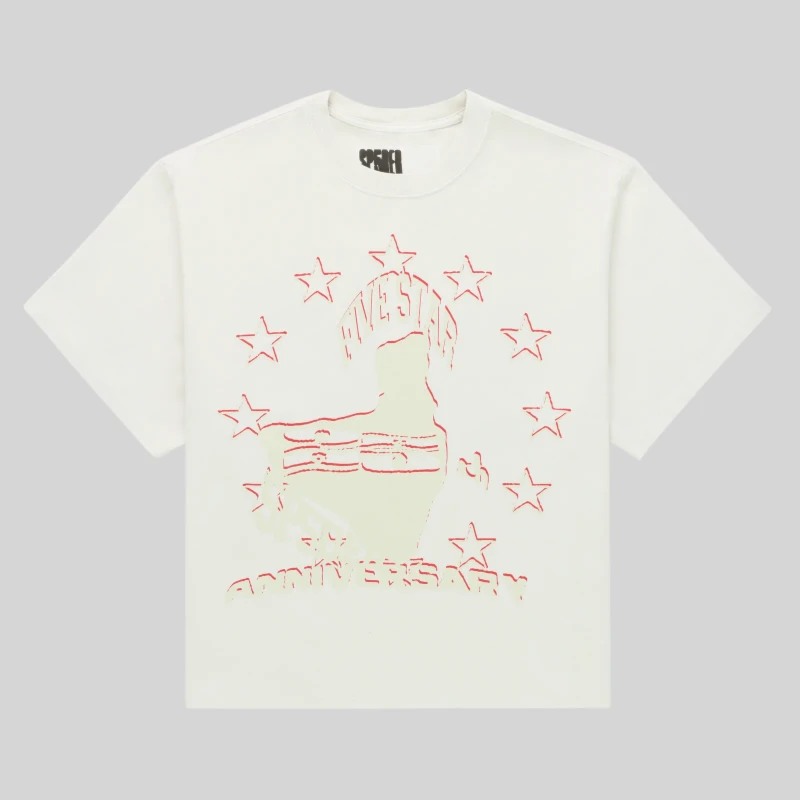 Front view of the off-white Sp5der Anniversary Tee featuring a red star graphic design and logo branding on chest