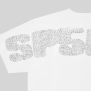 Close-up view of the Sp5der Rhinestone Silk Tee featuring detailed rhinestone embellishments on a white cotton fabric.