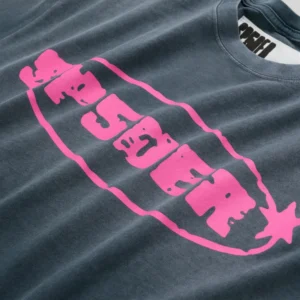 Close up of the Sp5der Form 5 Tee in black featuring a vibrant pink SP5DER graphic print on premium cotton fabric