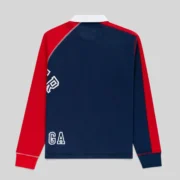 Back view of the Navy Sp5der Academy Rugby shirt featuring red raglan sleeves and white collar detail for streetwear.