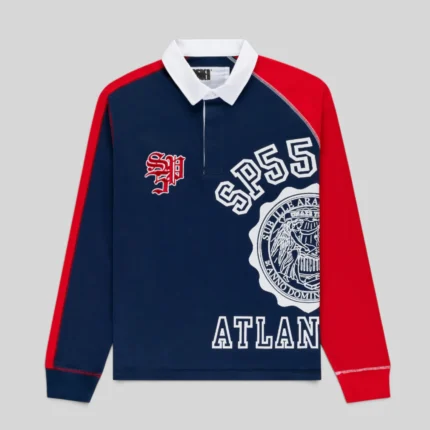 Front view of the Navy Sp5der Academy Rugby long-sleeve shirt with red sleeves and white logo graphics.