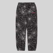Black Sp5der sweatpants featuring an embroidered all-over web design and logo on the leg, shown from the front view.