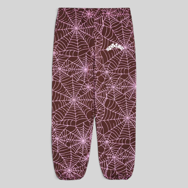 Brown Sp5der All Over Print sweatpant with embroidered web design and logo on the leg, front view of streetwear joggers.