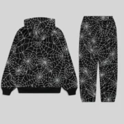 Back view of the black Sp5der tracksuit featuring an all-over embroidered white spider web design on cotton fleece.