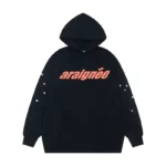 Front view of the Sp5der Araignee hoodie in black with orange logo text and white star sleeve graphic details.