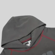 Close-up view of the Sp5der Archive Contrast Hoodie in Slate Grey, showcasing the premium cotton fleece fabric details.