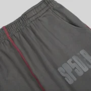 Close-up of the Sp5der Archive Contrast Sweatpants in Slate Grey featuring the iconic front brand logo print design.
