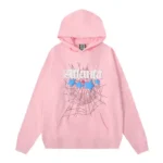 Front view of the premium Baby-Pink Sp5der Atlanta hoodie featuring a loose fit and signature distressed web print.