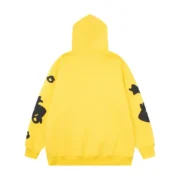 Back view of the premium Sp5der Beluga Hoodie in gold featuring a loose fit and signature distressed print design.