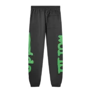 Back view of the premium Sp5der Beluga Sweatpants in Jet-Black featuring iconic green graphic branding and a back pocket.