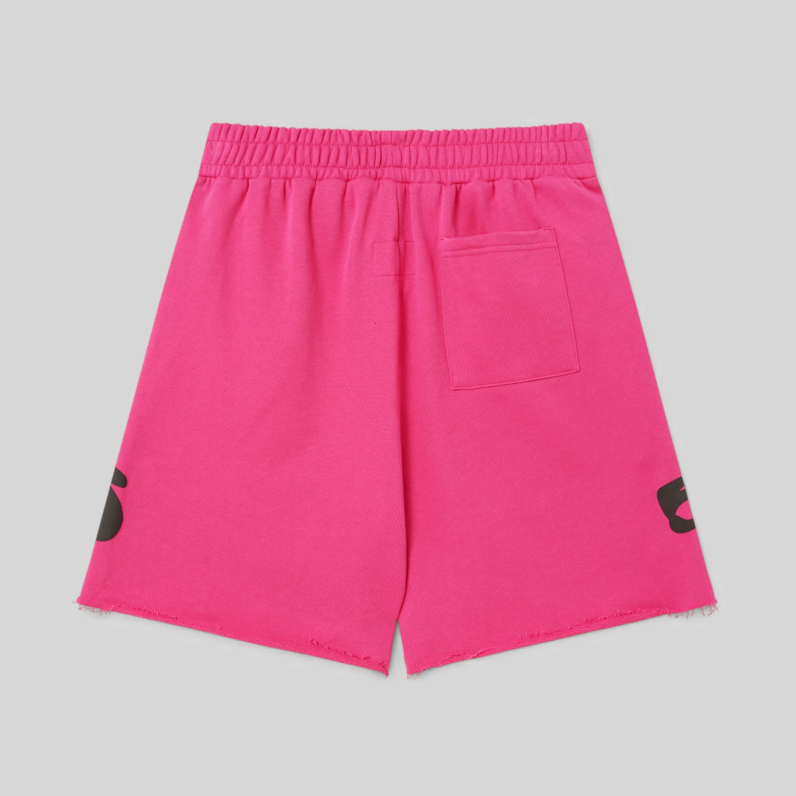 Back view of the vibrant pink Sp5der Beluga Sweatshorts from the SS26 streetwear collection with a back pocket.