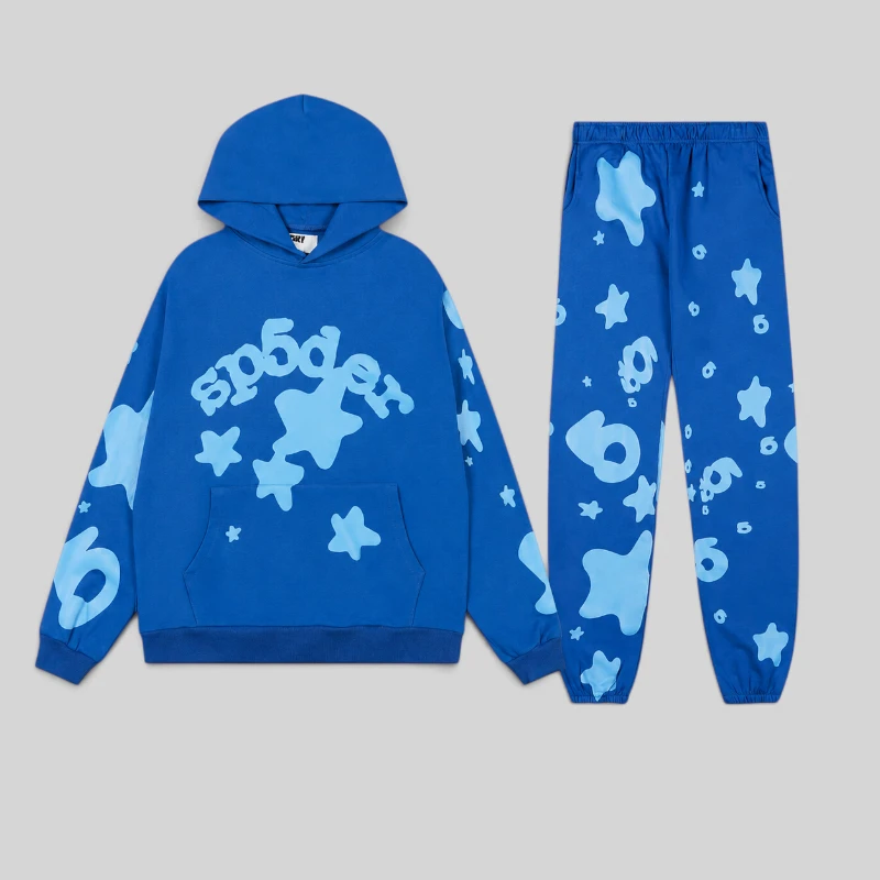 Sp5der Beluga V2 Tracksuit in blue featuring signature graphic print and star motifs on cotton fleece hoodie and pants