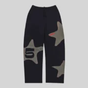 Front view of Sp5der Big Star Black Wide Leg Sweatpants made from heavy 13oz cotton fleece with frayed star patches.