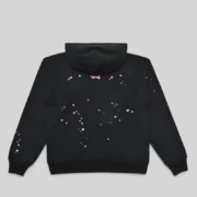 Back view of the black Sp5der CB Punk V2 Hoodie featuring colorful star graphics and a premium cotton construction.