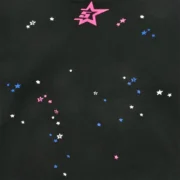 Close-up view of the graphic print detail on the black Sp5der CB Punk V2 Hoodie featuring star and owl imagery.