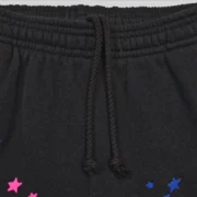 Close-up of the black adjustable drawstring waistband on the Sp5der CB Punk V2 Owl fleece sweatpants.