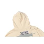 Close-up view of the Sp5der Cropped Hoodie in cream featuring Five Pro 2021 Motocross Championship graphic detailing.