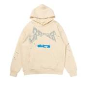 Front view of the premium cream Sp5der cropped hoodie featuring unique distressed print and urban style design.